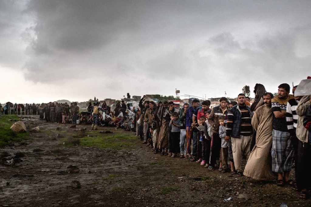Families fleeing the battle for Mosul, Iraq 2017. Photo: Quentin Bruno. CC BY-NC-ND 2.0