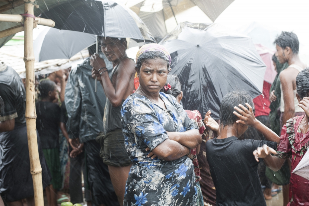 The UK could do more to help prevent atrocities such as those now being experienced by the Rohingya. (Picture: Rohingya woman in the rain, Steve Gumaer, CC BY-NC 2.0)