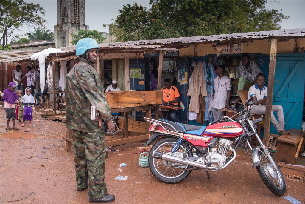 Military and police peacekeepers serving with the UN Multidimensional Integrated Stabilization Mission in the Central African Republic (MINUSCA) patrol the Muslim enclave of PK5 in Bangui. Credit: UN Photo/Eskinder Debebe 22 October 2017 Bangui, Central African Republic License: CC BY-NC-ND 2.0