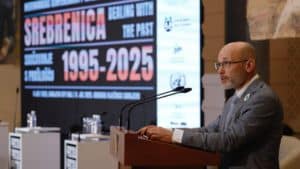 Aegis Founder Dr James Smith speaks in Sarajevo City Hall 8 July 2025 - photo by P-CRC